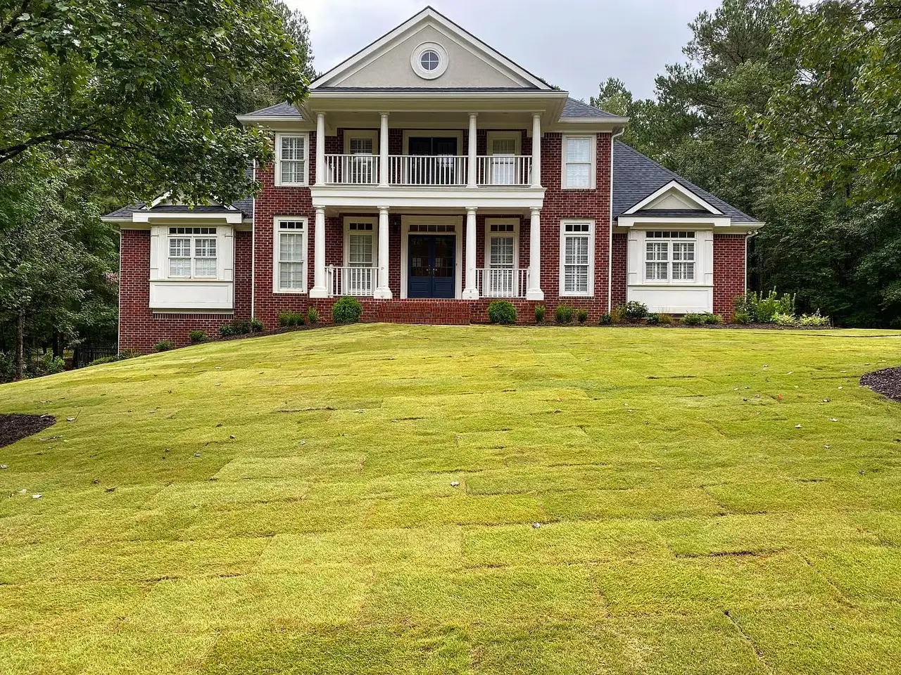 Brick home with a new sod lawn