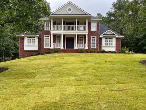 Brick home with a new sod lawn