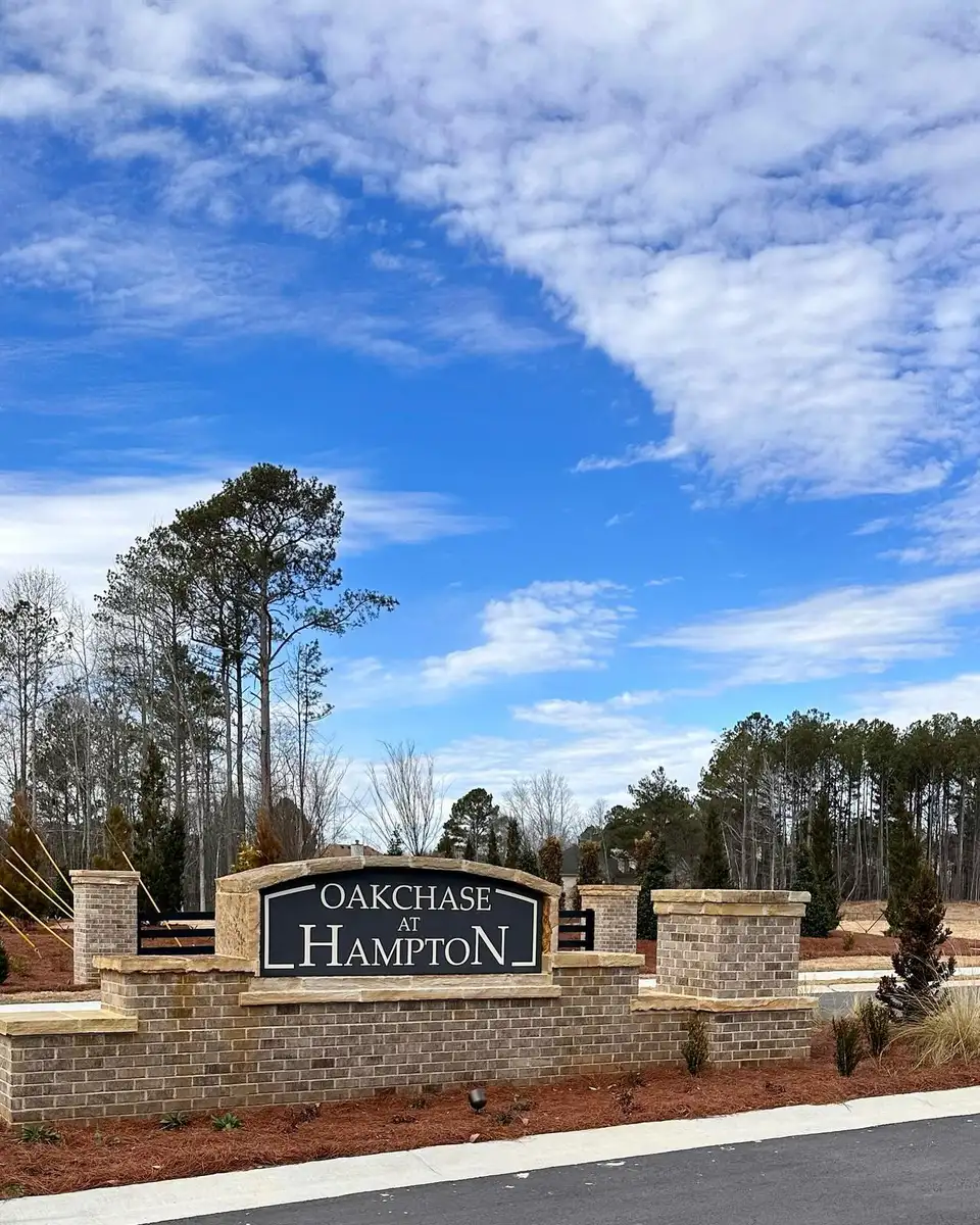 Oakchase at Hampton brick entrance sign with fresh landscaping