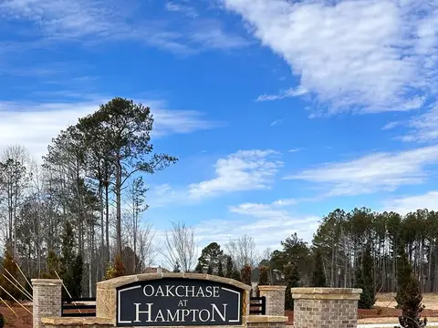 Oakchase at Hampton brick entrance sign with fresh landscaping